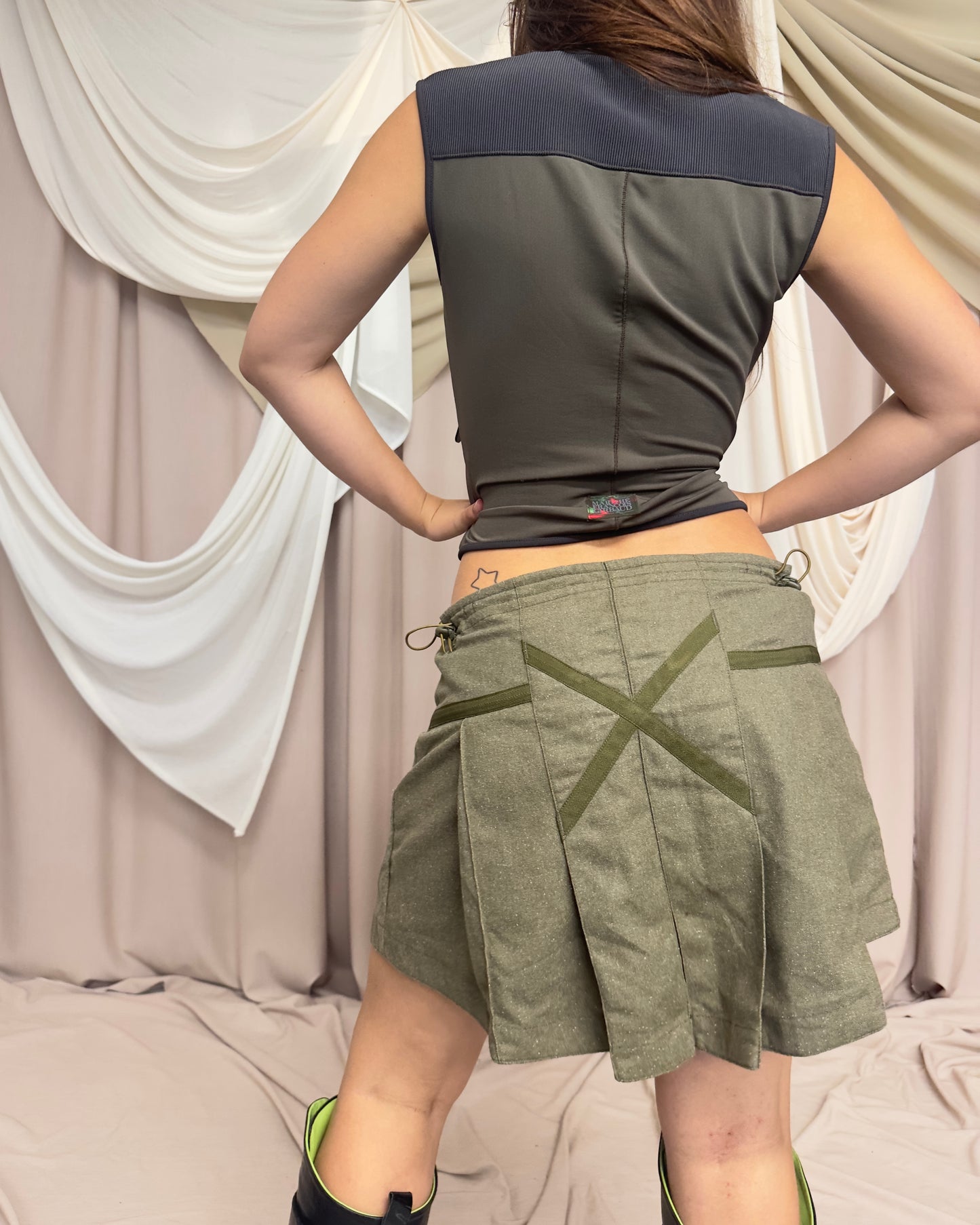 KHAKI PLEATED WOOLEN MIDI SKIRT WITH CURVED HEM by Maharishi