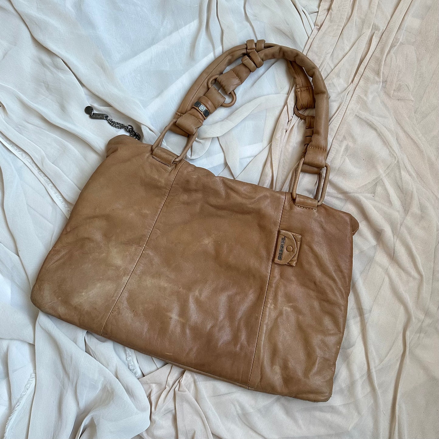 LEATHER PADDED PILLOW BAG IN TAN by Diesel