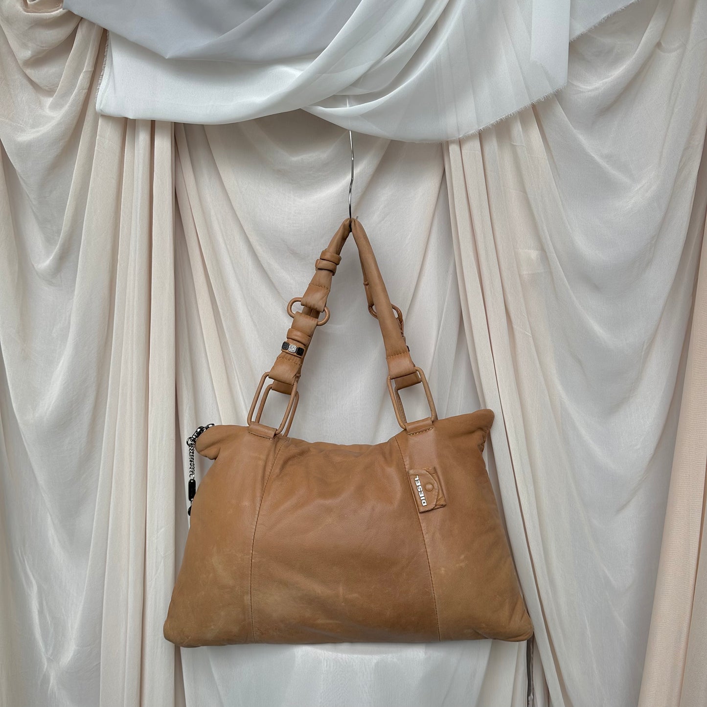 LEATHER PADDED PILLOW BAG IN TAN by Diesel