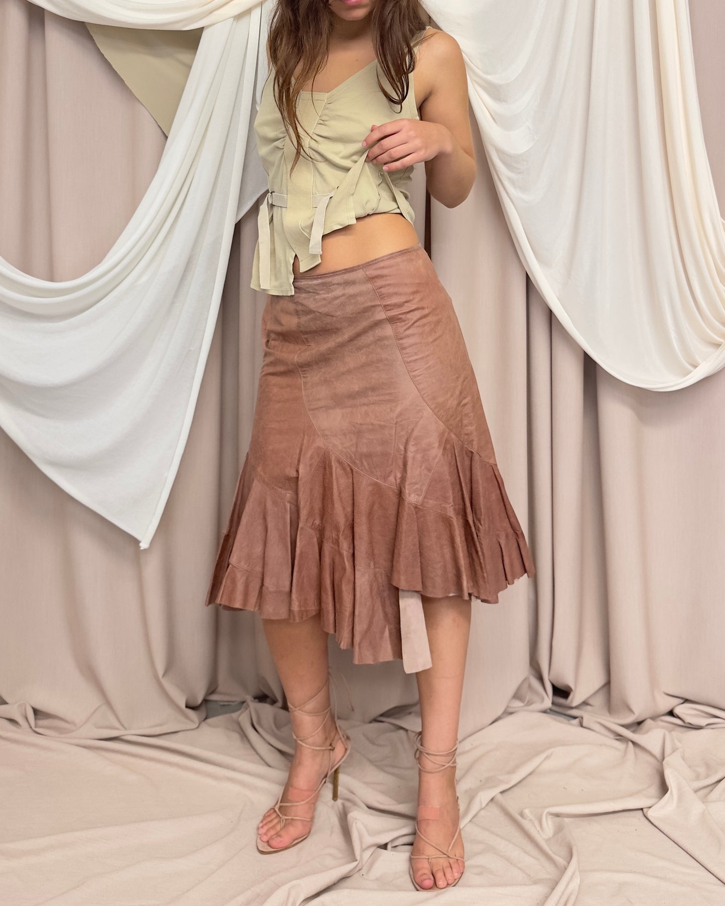 LEATHER MIDI SKIRT WITH ASYMMETRICAL RAW CUT HEM by Plein Sud
