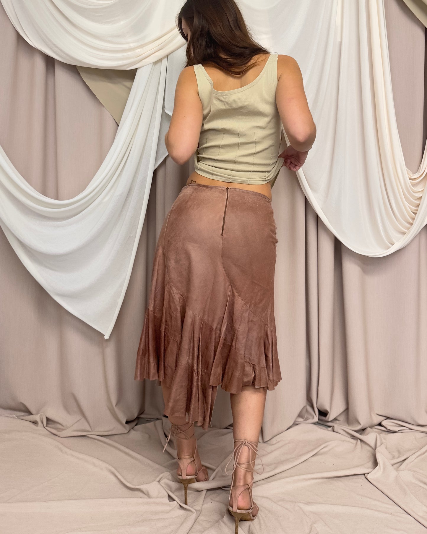 LEATHER MIDI SKIRT WITH ASYMMETRICAL RAW CUT HEM by Plein Sud