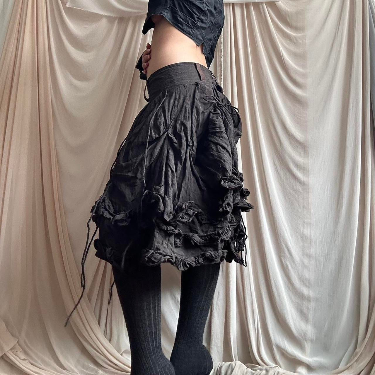 DARK BROWN METAL BLEND SKIRT WITH RUCHED DECONSTRUCTED DETAIL by Marithé + François Girbaud