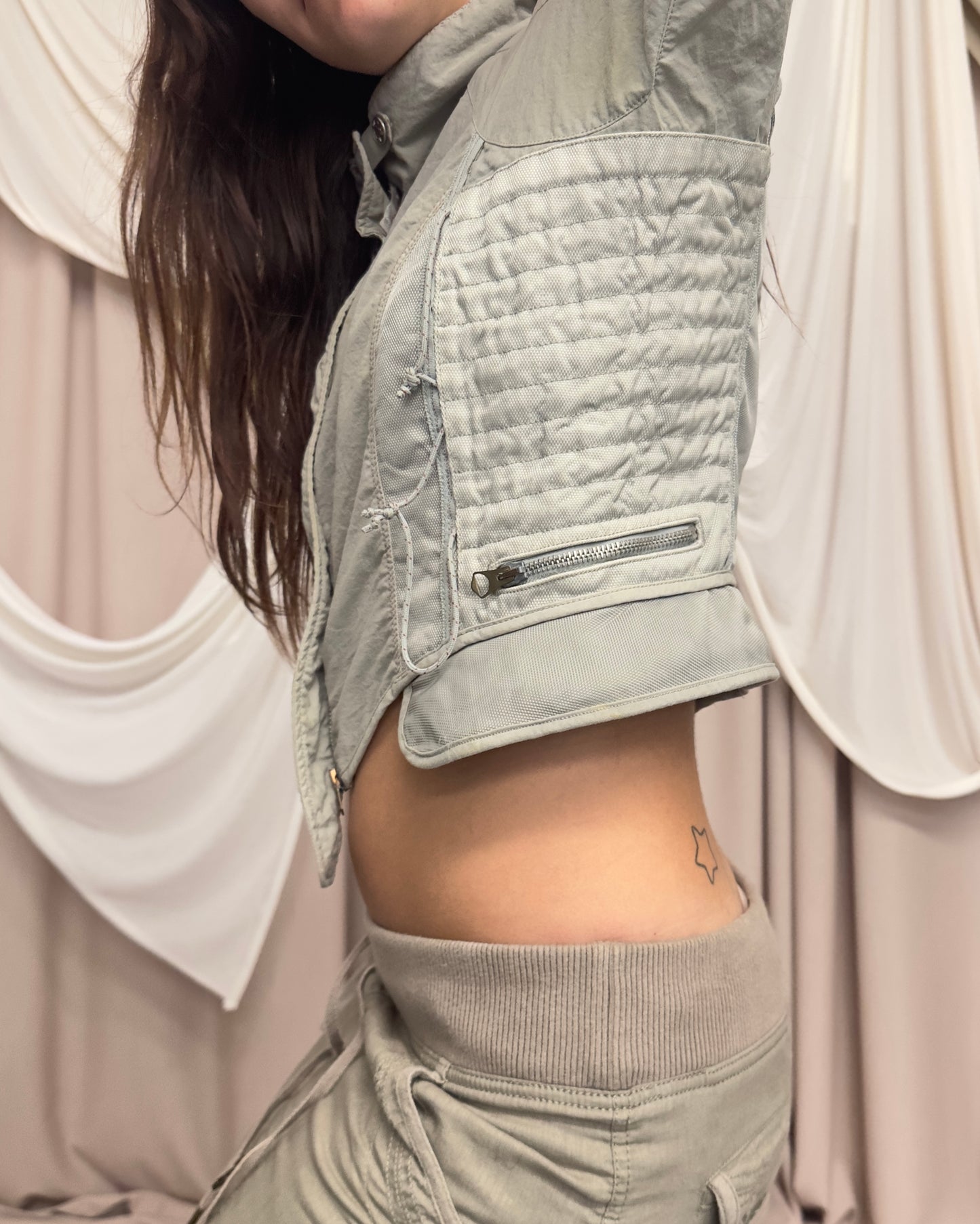 CROPPED STRUCTURED JACKET WITH MESH PANELS AND UTILITARIAN DETAILS by Marithé + François Girbaud