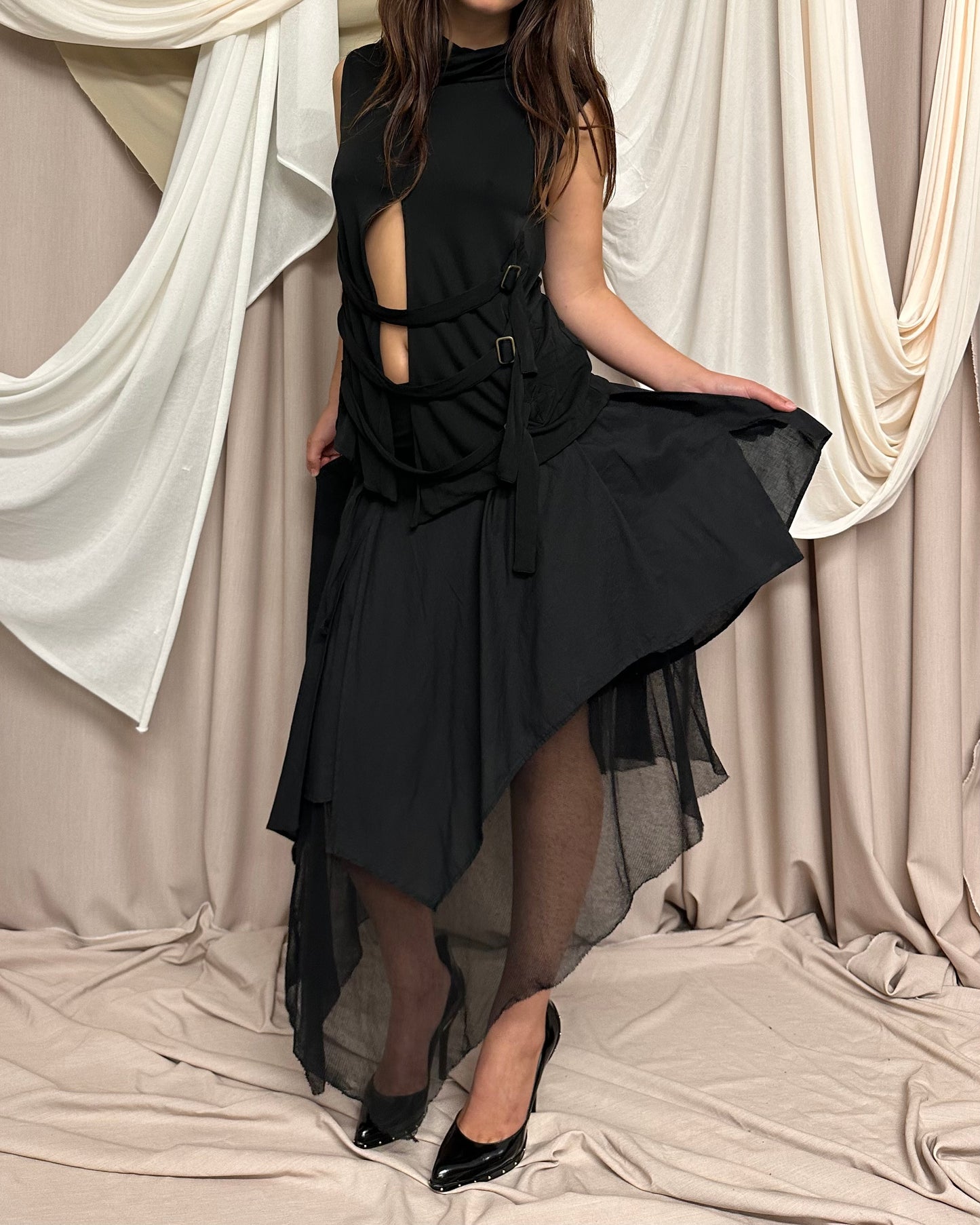 LAYERED BI-MATERIAL MIDI SKIRT WITH ASYMMETRICAL HEMS by Hybris
