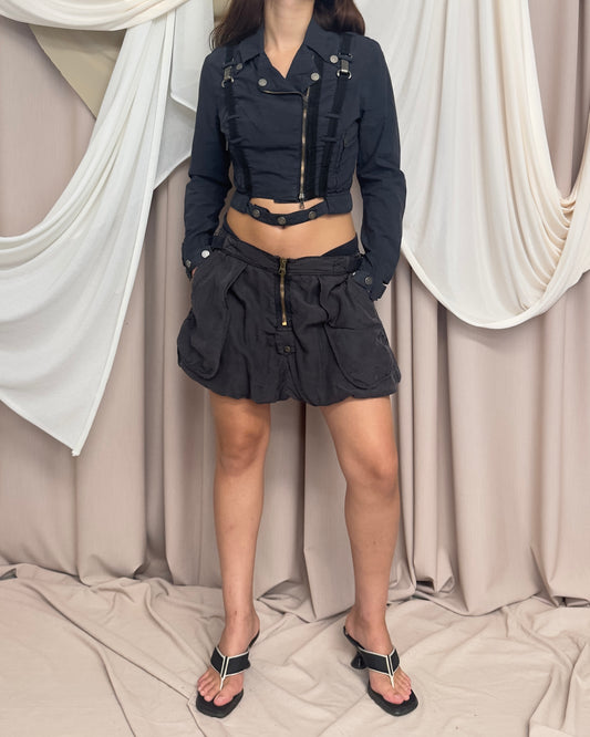 SILK UTILITY MINI SKIRT WITH BRASSY HARDWARE AND OVERSIZED POCKETS
