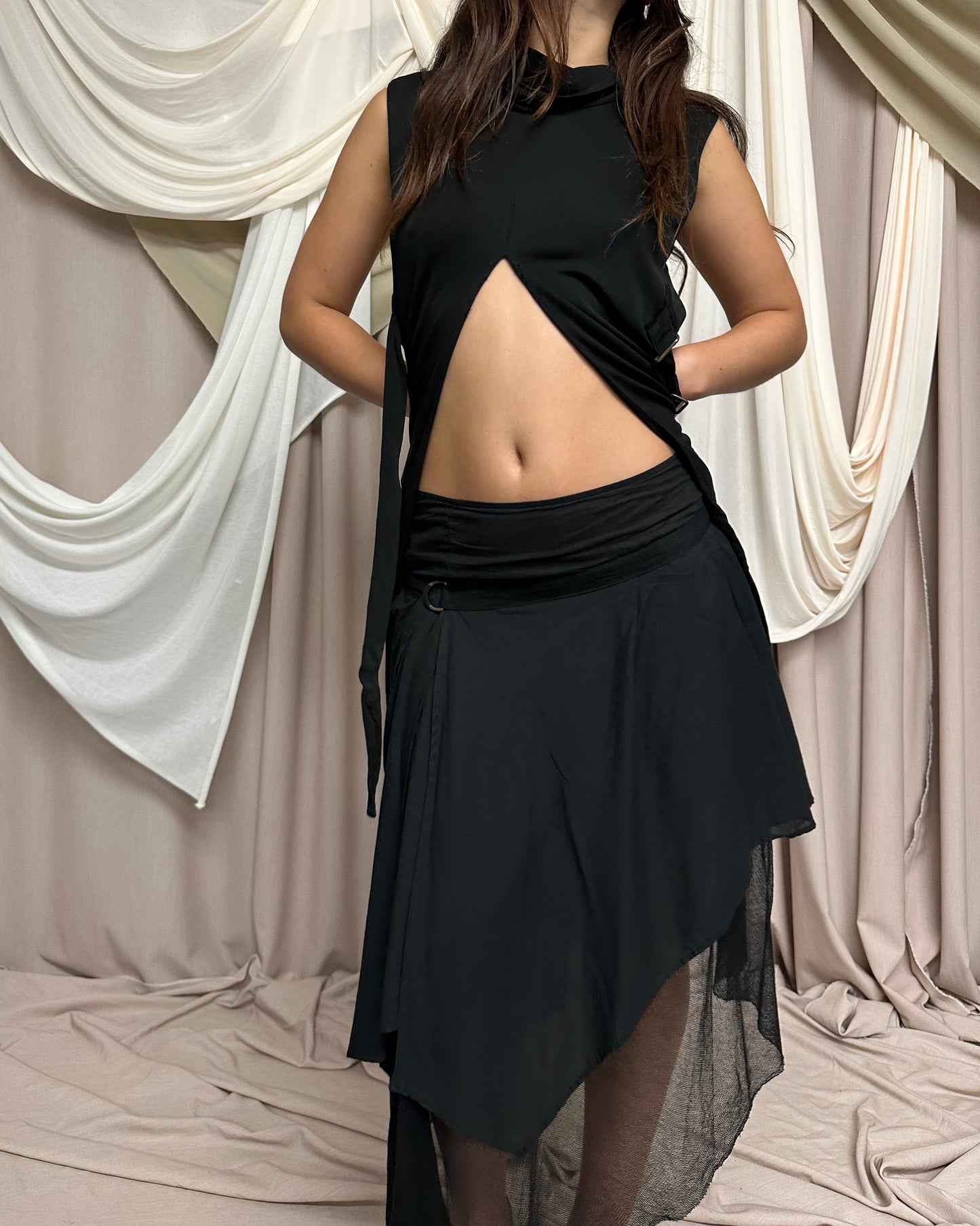LAYERED BI-MATERIAL MIDI SKIRT WITH ASYMMETRICAL HEMS by Hybris