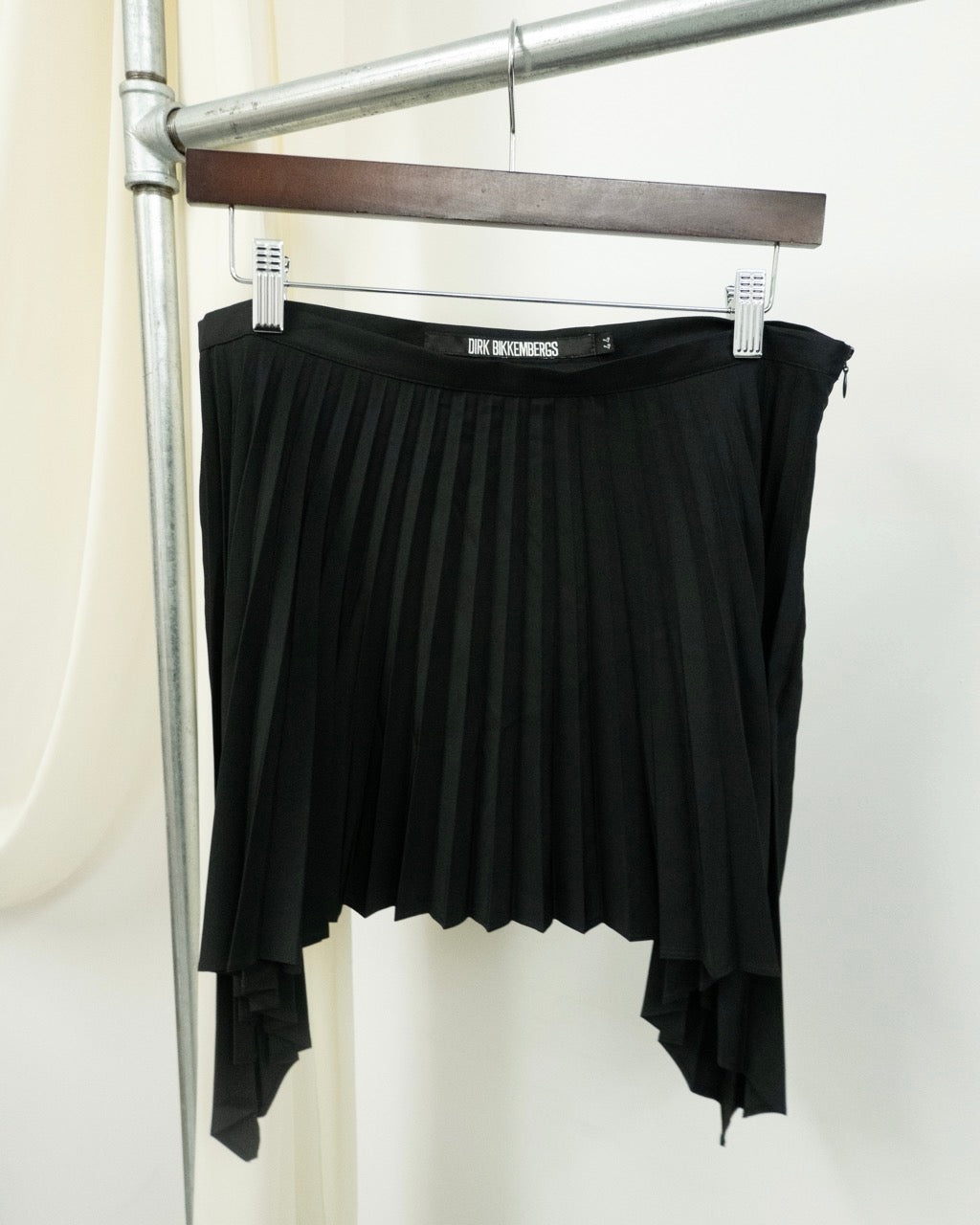 PLEATED ASYMMETRIC SKIRT BY DIRK BIKKEMBERGS