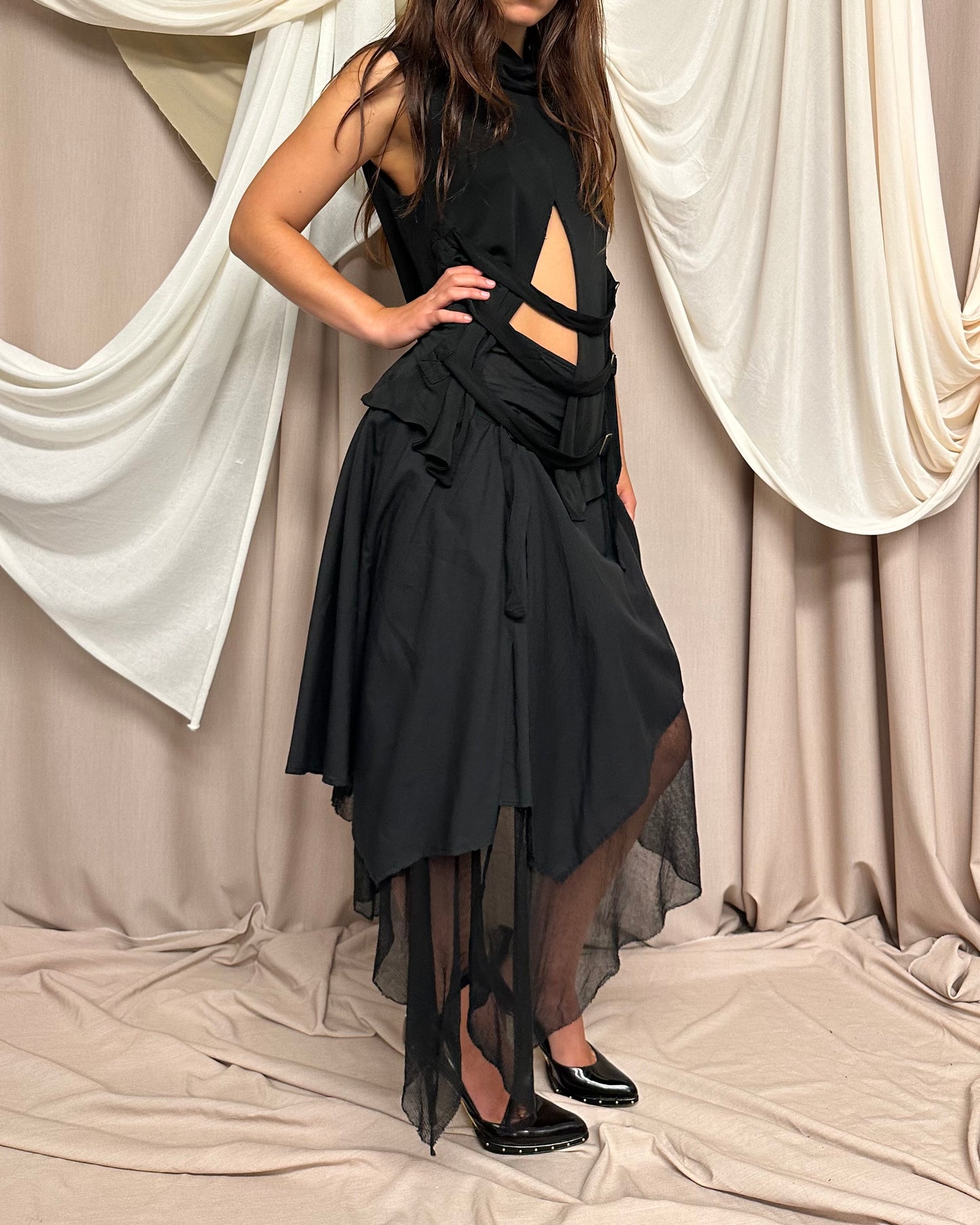 LAYERED BI-MATERIAL MIDI SKIRT WITH ASYMMETRICAL HEMS by Hybris