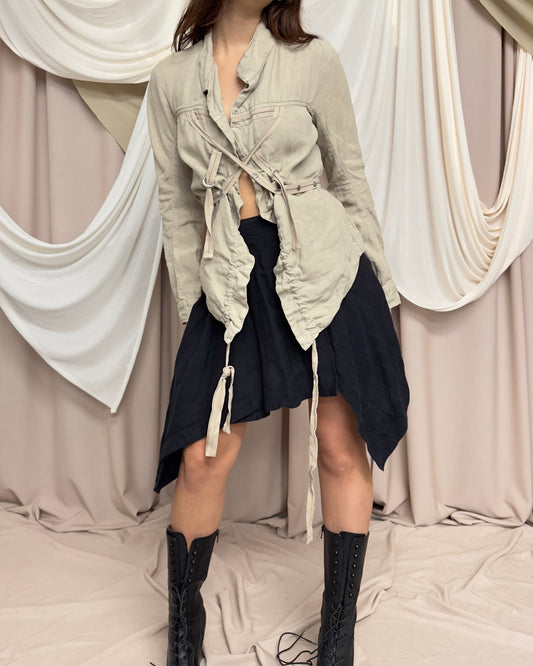 BEIGE LINEN LIGHTWEIGHT JACKET WITH ASYMMETRICAL HEM AND UTILITARIAN STRAPS by Marithé + François Girbaud