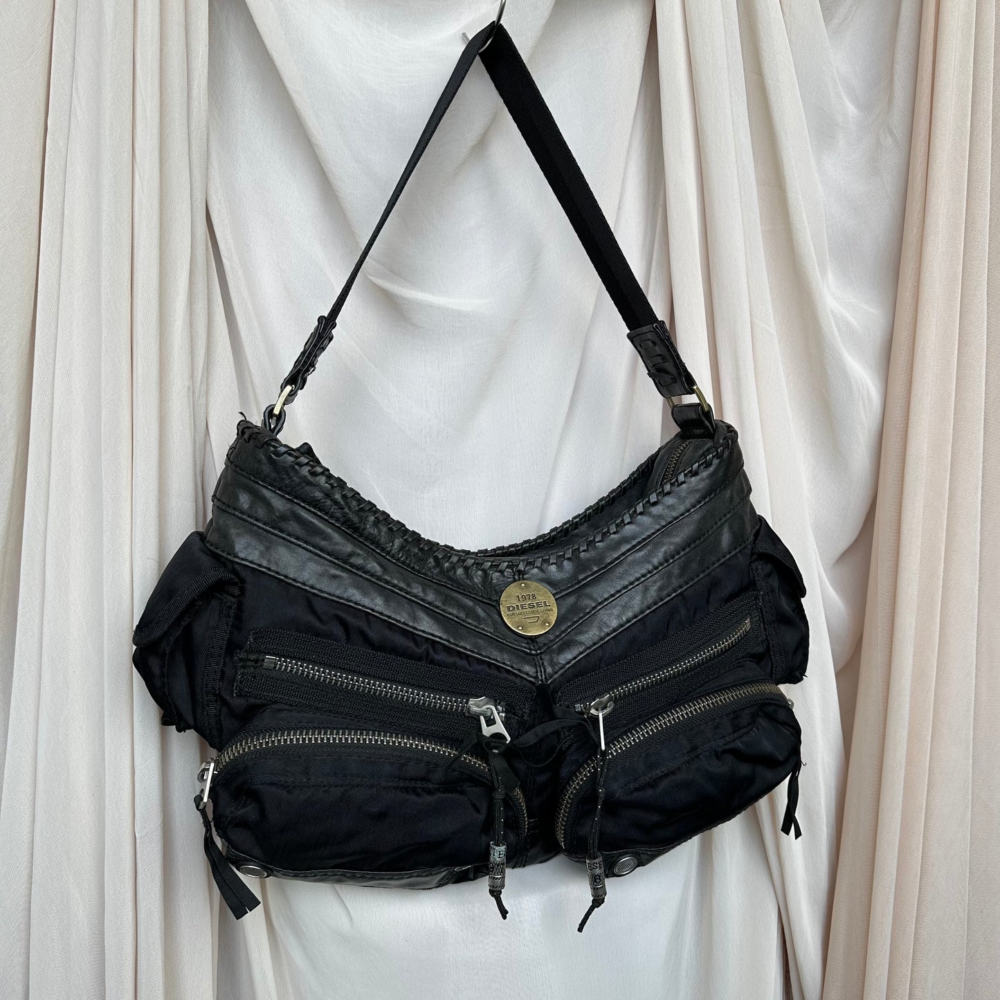 BI-MATERIAL LEATHER + NYLON CARGO HANDBAG IN BLACK by Diesel