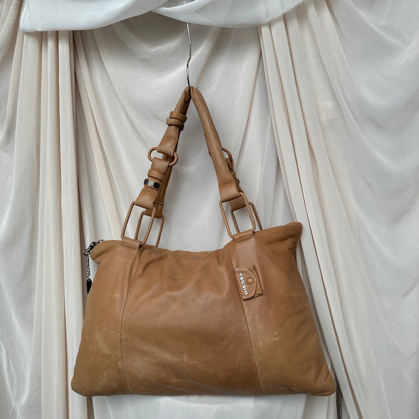 LEATHER PADDED PILLOW BAG IN TAN by Diesel