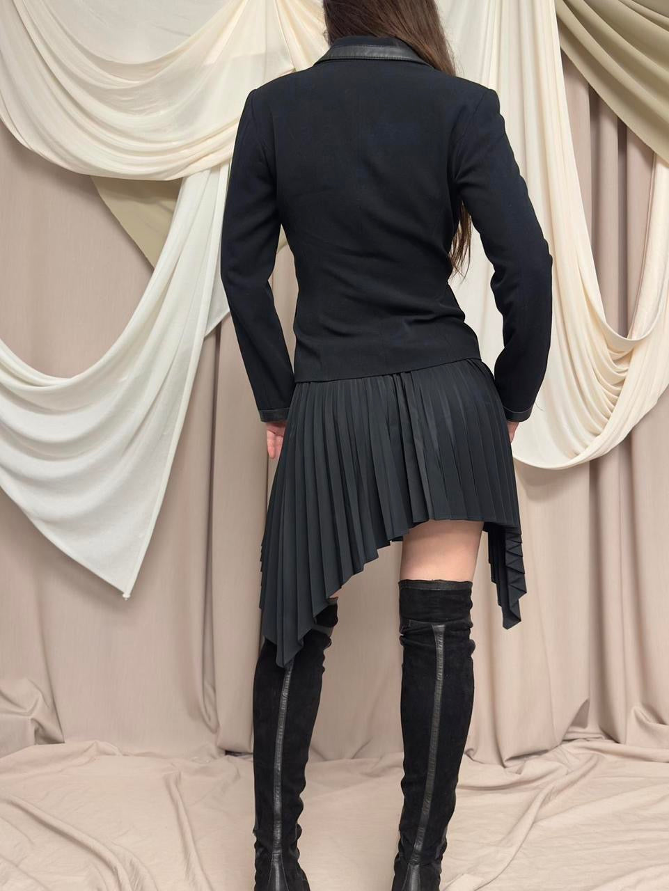 PLEATED ASYMMETRIC SKIRT BY DIRK BIKKEMBERGS