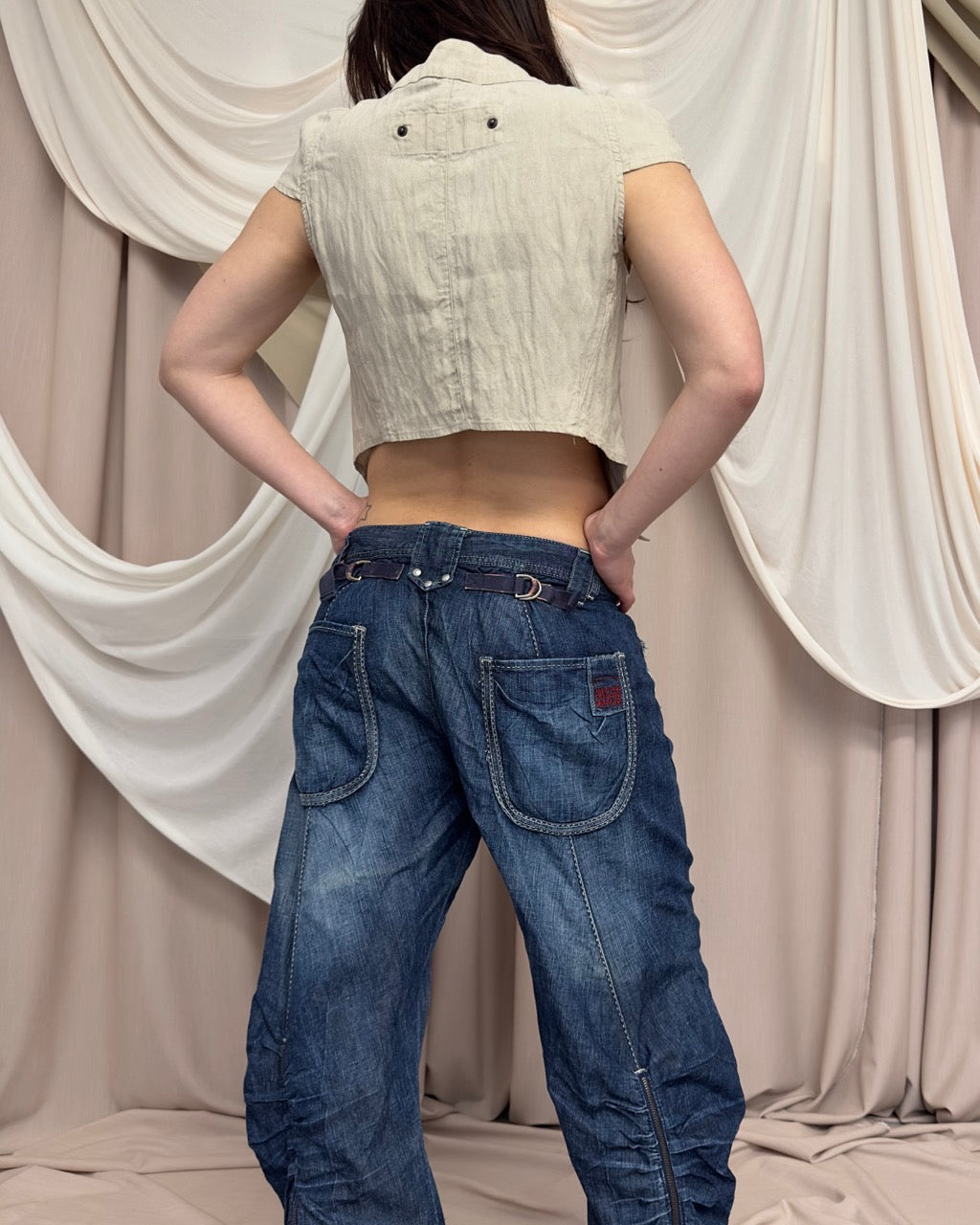 CROPPED ASYMMETRIC SLEEVELESS JACKET by Sarah Pacini