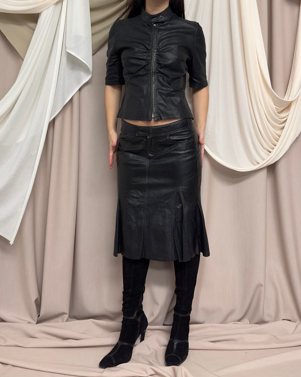 BLACK SHORT SLEEVE PERFORATED LEATHER JACKET by Nolita