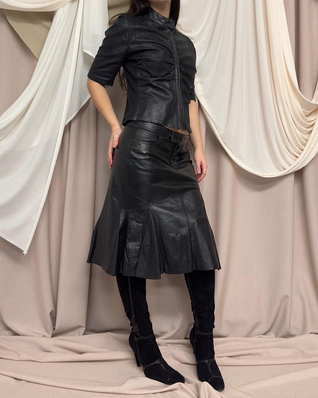 BLACK SHORT SLEEVE PERFORATED LEATHER JACKET by Nolita