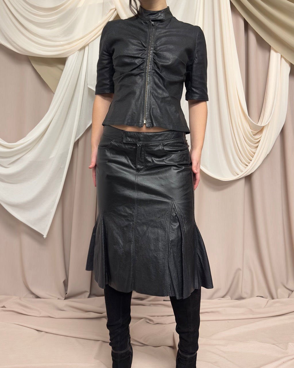BLACK SHORT SLEEVE PERFORATED LEATHER JACKET by Nolita