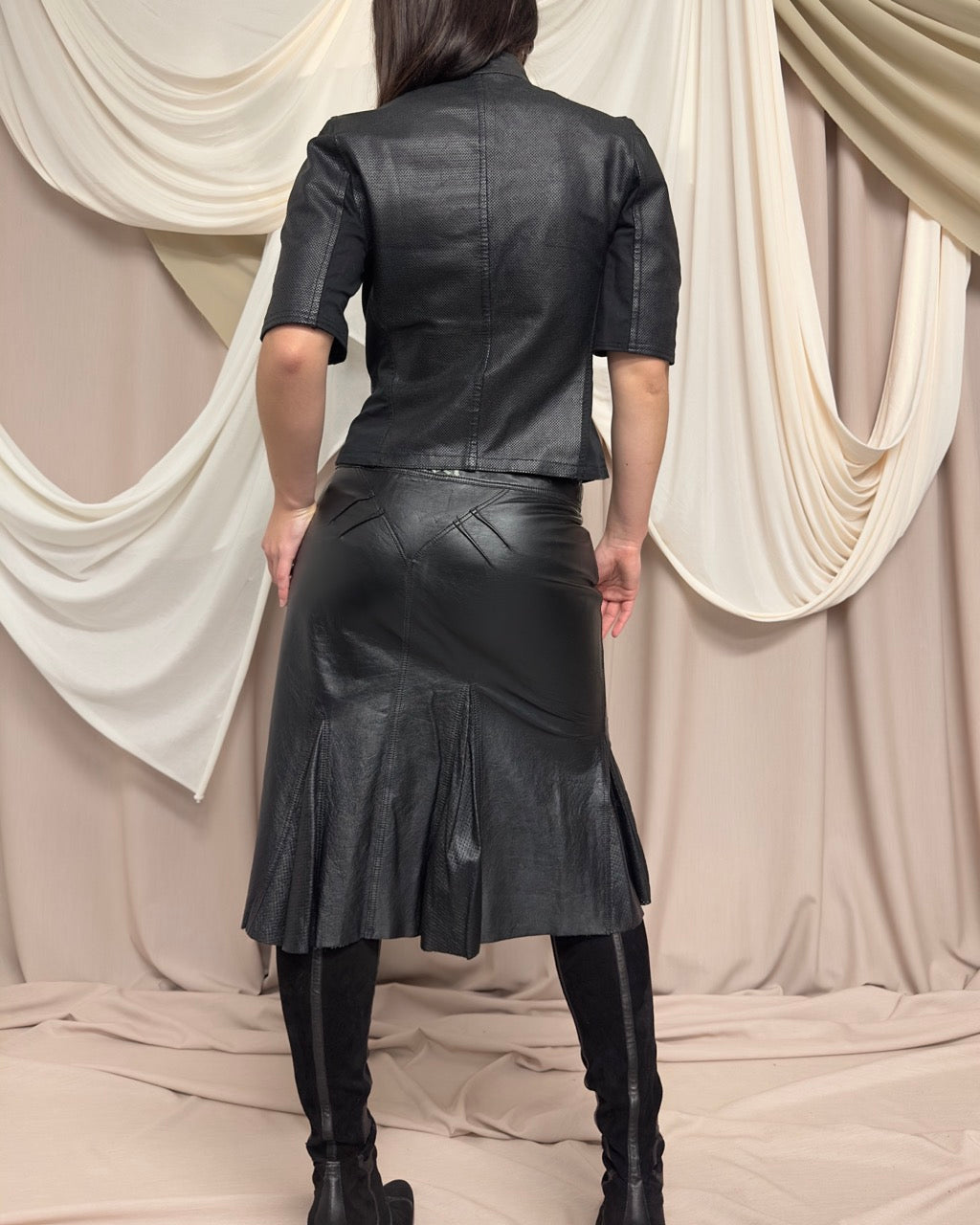 BLACK SHORT SLEEVE PERFORATED LEATHER JACKET by Nolita