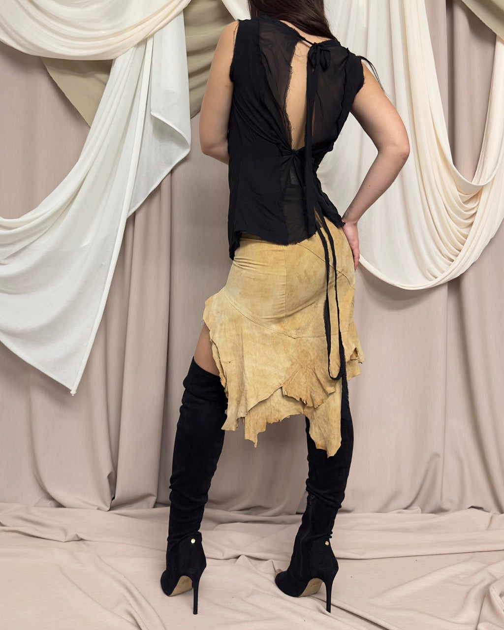 DECONSTRUCTED ASYMMETRIC GOAT SKIN SKIRT