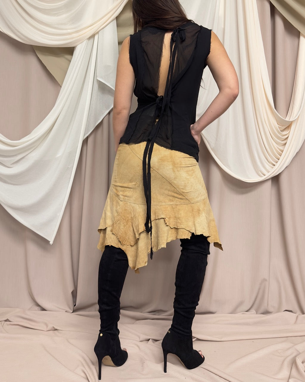 DECONSTRUCTED ASYMMETRIC GOAT SKIN SKIRT