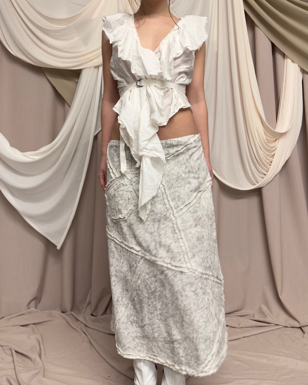 WHITE VEST WITH DISTRESSED RUFFLED PANEL
